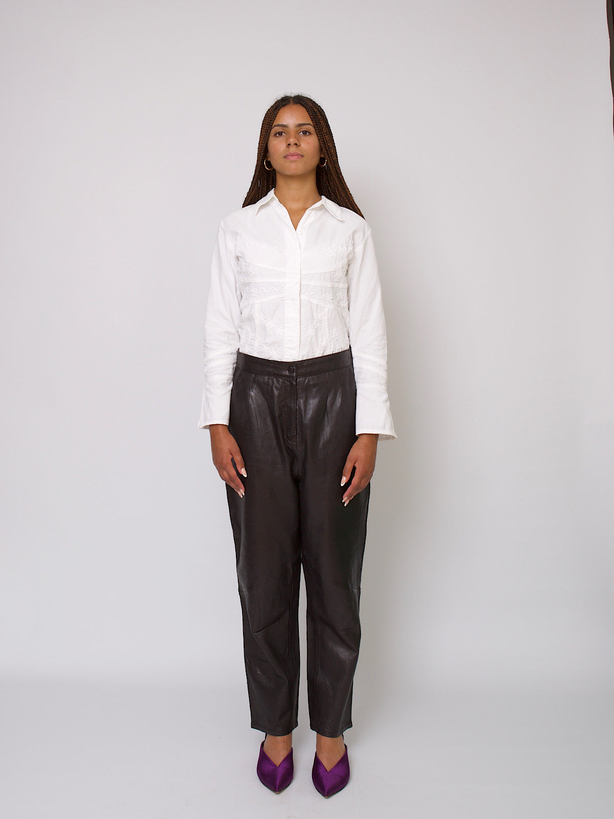 80s vintage high waisted pleated leather trousers in black